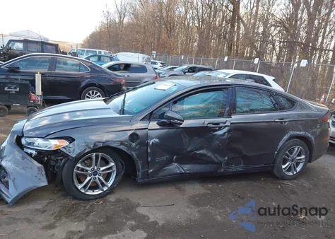 2015 Ford Fusion Energi Titanium z USA, uszkodzony, nr VIN 3FA6P0SU5FR289266